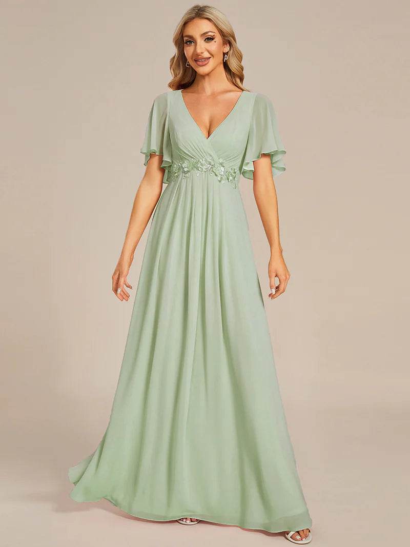 Elegant V-Neck Pleated Bridesmaid Dress with Floral Appliqués - Biamonde